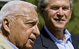 US President George W. Bush listening to Israeli Prime Minister Ariel Sharon, left, speaking at a joint news conference following their talks about the Middle East peace process at Bush’s ranch in Crawford, Texas, April 11, 2005. (J. Scott Applewhite/AP Images/JTA)