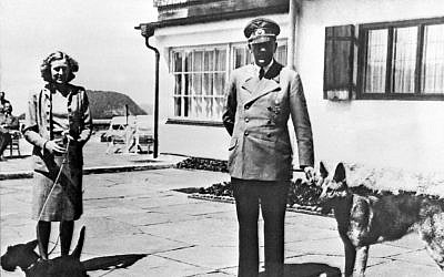 Undated file photo shows Adolf Hitler (right), and his mistress Eva Braun posing on the terrace of the Berghof, in Berchtesgeden, Germany. (AP, File)