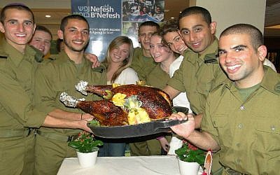 Lone soldiers and new immigrants from North America celebrate Thanksgiving. (Courtesy photo/NBN/Laura Ben-David)