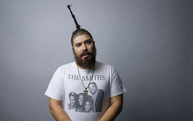 In this Oct. 29, 2015 photo, Josh "The Fat Jew" Ostrovsky poses for a portrait in New York. Ostrovsky and his upright ponytail have leaped off his racy Instagram account onto the pages of a new book, "Money Pizza Respect," a memoirish collection of debauchery out Tuesday, Nov. 3, 2015. (Photo by Drew Gurian/Invision/AP) In this Oct. 29, 2015 photo, Josh "The Fat Jew" Ostrovsky poses for a portrait in New York. Ostrovsky and his upright ponytail have leaped off his racy Instagram account onto the pages of a new book, "Money Pizza Respect," a memoirish collection of debauchery out Tuesday, Nov. 3, 2015. (Photo by Drew Gurian/Invision/AP)