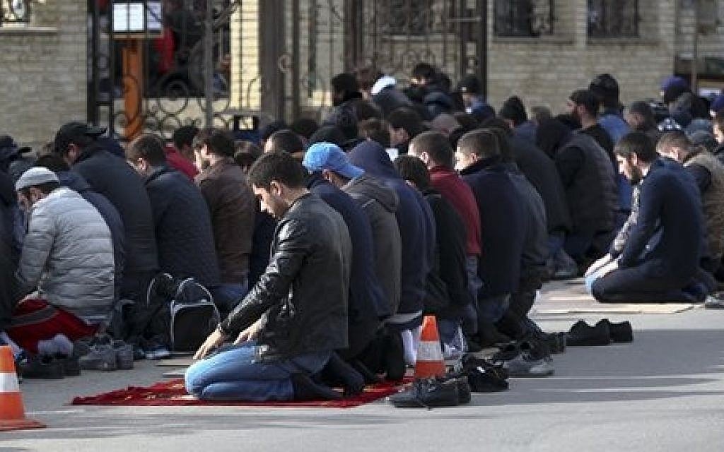 In this photo taken Friday, Nov. 13, 2015, men attend a Friday prayer at the mosque on Kotrova street in Dagestan's regional capital Makhachkala, Russia. (Sergei Grits/AP) In this photo taken Friday, Nov. 13, 2015, men attend a Friday prayer at the mosque on Kotrova street in Dagestan's regional capital Makhachkala, Russia. (Sergei Grits/AP)
