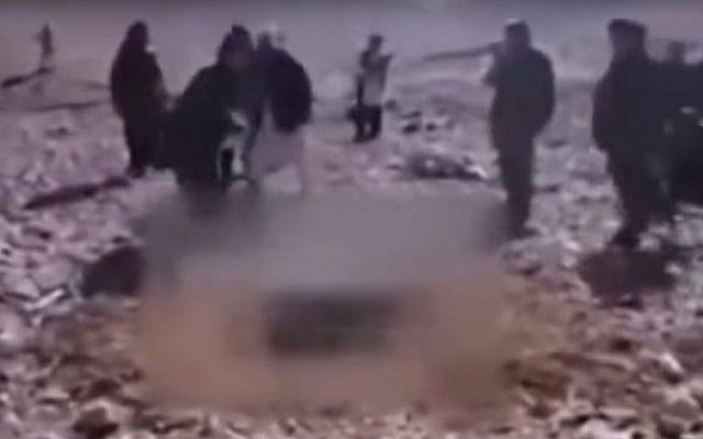 Still from video purportedly showing Taliban insurgents stoning an Afghani woman to death on October 24, 2015 (YouTube screenshot) Still from video purportedly showing Taliban insurgents stoning an Afghani woman to death on October 24, 2015 (YouTube screenshot)