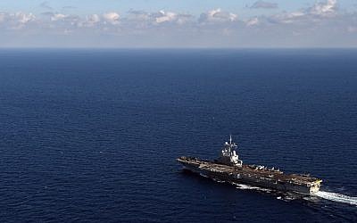 An aerial view shows the Charles de Gaulle aircraft carrier on in the eastern Mediterranean Sea on November 21, 2015. The carrier has been deployed to boost operations in Syria as Paris intensifies a bombing campaign against the Islamic State group there. (Anne-Christine Poujoulat/AFP)