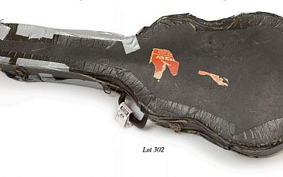 A Rabbi Shlomo Carlebach's guitar was put on the block on behalf of Rabbi Yehoshua Book, the guitar’s consignor. (courtesy) A Rabbi Shlomo Carlebach's guitar was put on the block on behalf of Rabbi Yehoshua Book, the guitar’s consignor. (courtesy)
