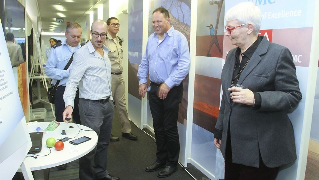EMC Israel chairperson Orna Berry (right) looks on at one of the technologies on display at EMC Global Innovation Day, November 17, 2015 (Courtesy) EMC Israel chairperson Orna Berry (right) looks on at one of the technologies on display at EMC Global Innovation Day, November 17, 2015 (Courtesy)
