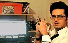 Exiled Iranian poet Payam Feili, in an undated image from a YouTube video in which Feili asks Israelis to help him in his bid to come visit Israel. (YouTube screenshot)