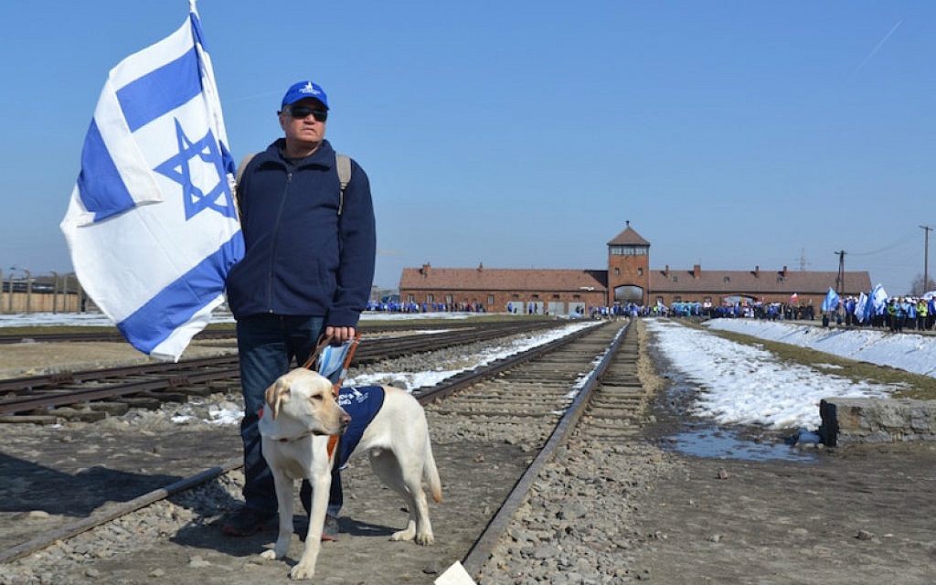 A blind participant in the March of the Living featured in the new documentary 'Blind Love.' (Eli Ben Boher/via JTA) A blind participant in the March of the Living featured in the new documentary 'Blind Love.' (Eli Ben Boher/via JTA)