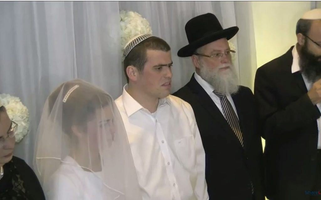 Sarah Techiya Litman, whose father and brother were killed in a terror attack two weeks ago, is married in Jerusalem on November 26, 2015 (YouTube screenshot)
