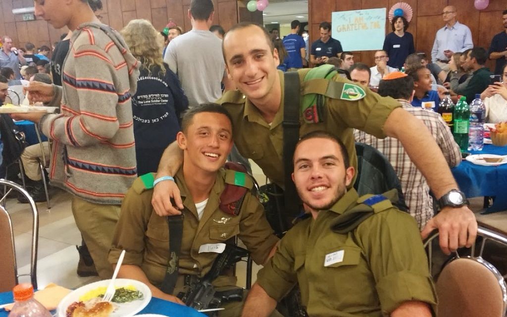 IDF lone soldiers from the US enjoy a Thanksgiving dinner on November 26, 2015. (Simona Weinglass/Times of Israel) IDF lone soldiers from the US enjoy a Thanksgiving dinner on November 26, 2015. (Simona Weinglass/Times of Israel)
