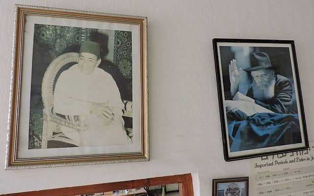 Photos of King Hassan II and Rabbi Menachem Mendel Schneerson adorn the wall of the Chabad facility in Casablanca. (Ben Sales/JTA)