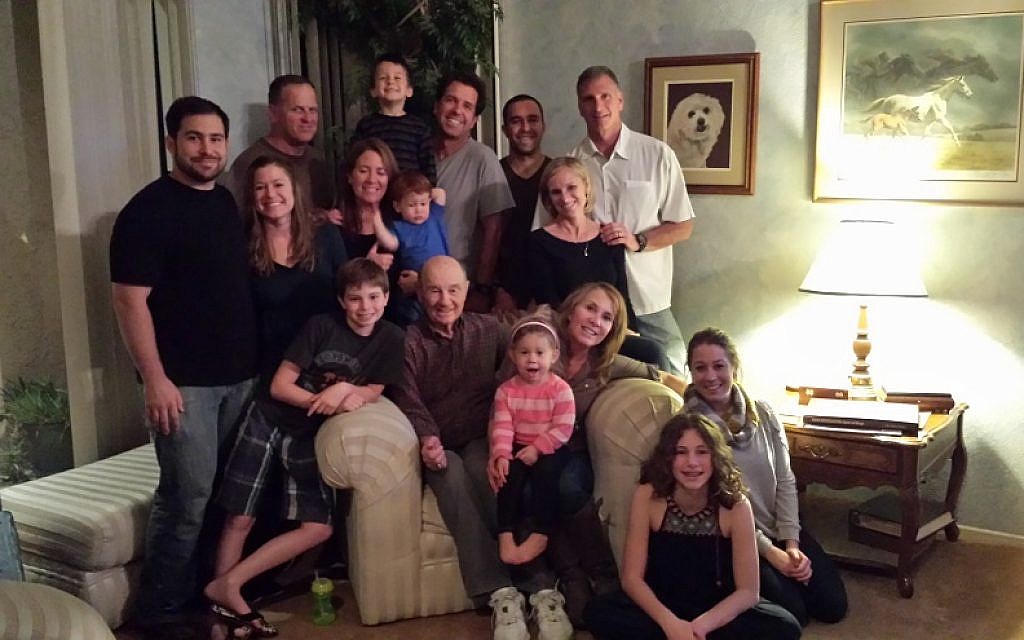 Norm Sherry, seated, surrounded by his children, grandchildren and great-grandchildren, January 2014. (Courtesy of Cyndi Sherry Fedele/via JTA) Norm Sherry, seated, surrounded by his children, grandchildren and great-grandchildren, January 2014. (Courtesy of Cyndi Sherry Fedele/via JTA)