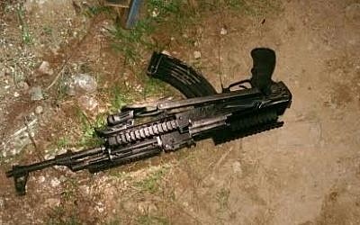 The gun that the Shin Bet says was used in the November 13 terror attack in the West Bank that killed Rabbi Yaakov Litman and his teenage son Netanel. (credit: Shin Bet)