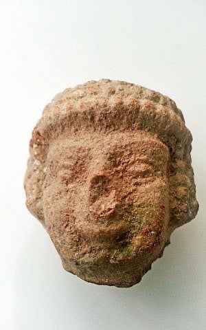 The head of an Iron Age statuette found by an 8-year-old while walking near Tel Beit Shemesh. (Alexander Glick, courtesy of Israel Antiquities Authority)