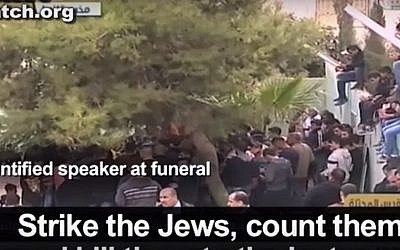 An image from the funeral of two Palestinians, Laith Manasrah and Abu al-Aish, where a speaker prayed for the extermination of all Jews. (screen capture: YouTube via PMW)
