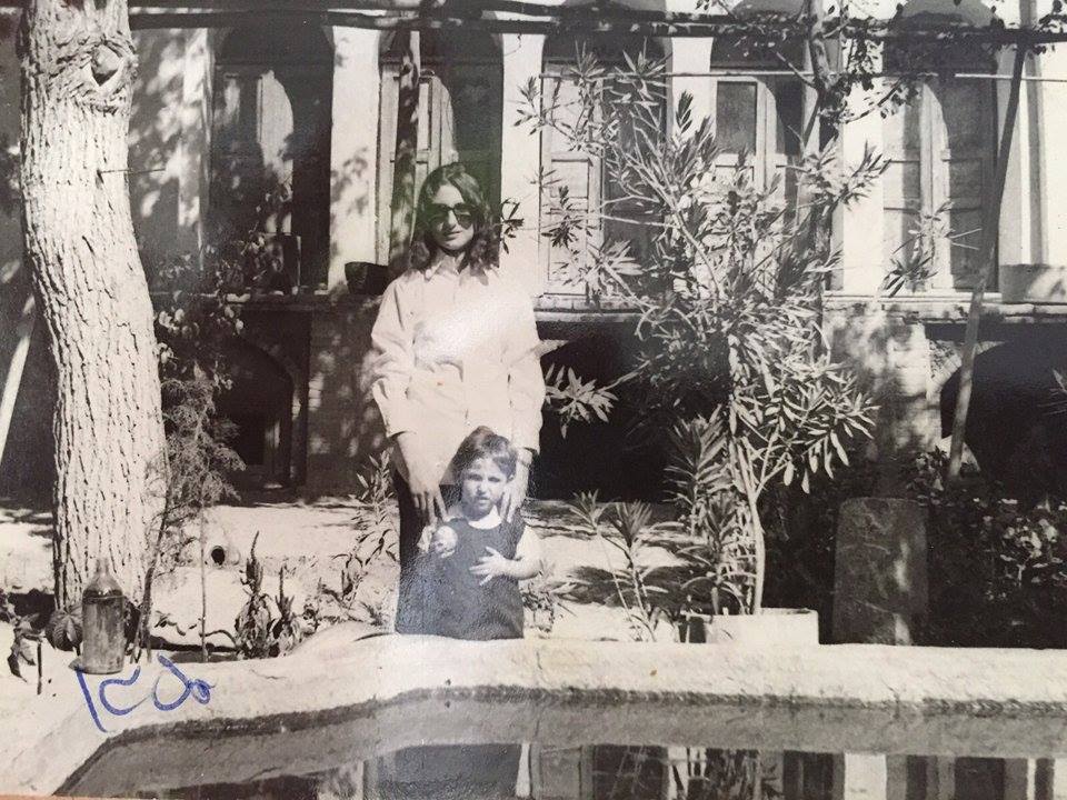 Noa Shalom and her younger sister Jannet in 1973 in front of their home in Golpayegan (Courtesy)