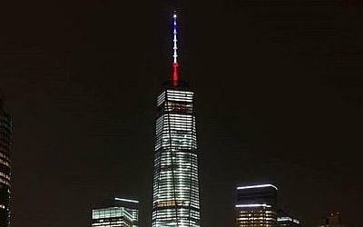 The One World Trade Center lights up in the colors of the French flag after deadly Paris attacks, November 13, 2015. (New York Governor's office)