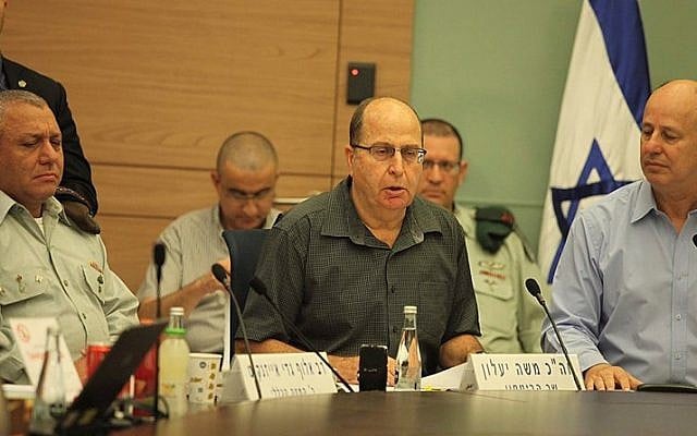 Defense Minister Moshe Ya'alon (C), Chairman of the Foreign Affairs and Defense Committee Tzachi Hanegbi (R) and IDF Chief of Staff Gadi Eisenkot attend a Foreign Affairs and Defense Committee meeting at the Knesset in Jerusalem on November 3, 2015. (Issac Harari/Flash90) Defense Minister Moshe Ya'alon (C), Chairman of the Foreign Affairs and Defense Committee Tzachi Hanegbi (R) and IDF Chief of Staff Gadi Eisenkot attend a Foreign Affairs and Defense Committee meeting at the Knesset in Jerusalem on November 3, 2015. (Issac Harari/Flash90)
