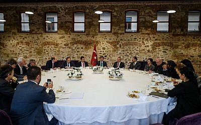 Turkish Prime Minister Ahmet Davutoglu speaks during a meeting with foreign media journalists at the prime minister's office in Istanbul, December 9, 2015. (Photo by AFP/Ozan Kose)