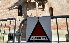 Illustrative: This photo taken on December 23, 2015 in the village of Pibrac, in the Haute-Garonne region, shows a French Vigipirate national security alert sign in front of a church before Christmas holiday celebrations.  (Pascal Pavani/AFP)