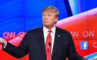 Republican presidential candidate and businessman Donald Trump gesturing during the Republican Presidential Debate, hosted by CNN, at The Venetian Las Vegas in Las Vegas, Nevada,  December 15, 2015. (AFP/ROBYN BECK)