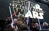 Fans dressed up as Star Wars characters pose ahead of the European premiere of 'The Force Awakens' in central London on December 16, 2015. (AFP / JUSTIN TALLIS)