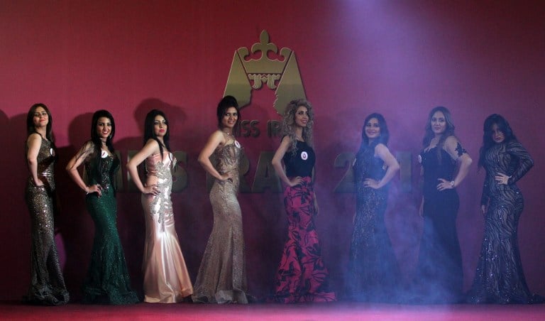 IRAQ-SOCIETY-BEAUTY Iraqi women taking part in the Miss Iraq beauty contest pose on stage on December 19, 2015 in the capital Baghdad. (Ahmad AL-Rubaye/AFP)