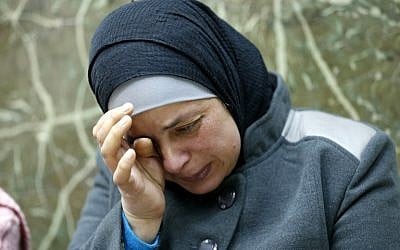 Suha, the mother of Palestinian teenager Muhammed Abu Khdeir, who was killed last year, reacts in the courtroom of the Jerusalem District Court on December 20, 2015. (AFP PHOTO/AHMAD GHARABLI)