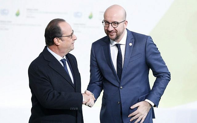 French President Francois Hollande greets Belgium Prime Minister Charles Michel as he arrives for the COP21 World Climate Change Conference in Le Bourget, north of Paris, on November 30, 2015. (Photo AFP Photo/Pool/Guillaume Horcajuelo) French President Francois Hollande greets Belgium Prime Minister Charles Michel as he arrives for the COP21 World Climate Change Conference in Le Bourget, north of Paris, on November 30, 2015. (Photo AFP Photo/Pool/Guillaume Horcajuelo)