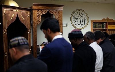 Illustrative image of American Muslim men praying at a mosque in Jersey City, New Jersey, on December 7, 2015. (AFP PHOTO/JEWEL SAMAD)