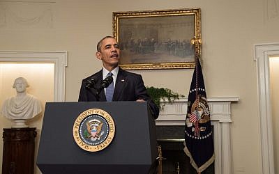 Then US President Barack Obama delivers a statement in the Cabinet Room at the White House in on December 12, 2015 after an international climate accord was reached in Paris. (AFP Photo/Nicholas Kamm)