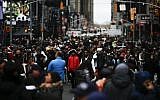 People gather for the New Year's Eve celebrations on December 31, 2015 in New York City. (Eduardo Munoz Alvarez/Getty Images/AFP)