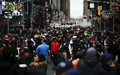 People gather for the New Year's Eve celebrations on December 31, 2015 in New York City. (Eduardo Munoz Alvarez/Getty Images/AFP)