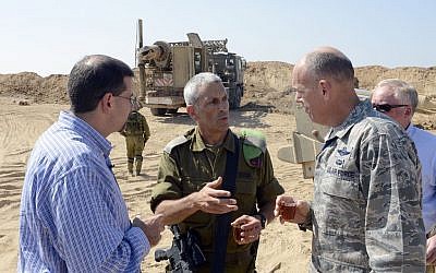Brig.-Gen. Mickey Edelstein, center, speaks with US Ambassador to Israel Dan Shapiro, left, and former US defense attache to Israel, Brig.-Gen. John Shapland outside of a tunnel from Gaza that was discovered near the Ein HaShlosha Kibbutz in southern Israel on October 17, 2013. (Matty Stern/U.S. Embassy Tel Aviv/CC BY-SA 2.0)