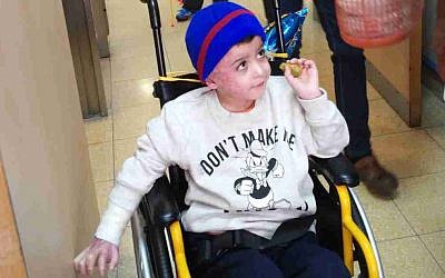 Ahmed Dawabsha in his room at Tel Hashomer Hospital in Ramat Gan, December 23, 2015 (Simona Weinglass/Times of Israel)