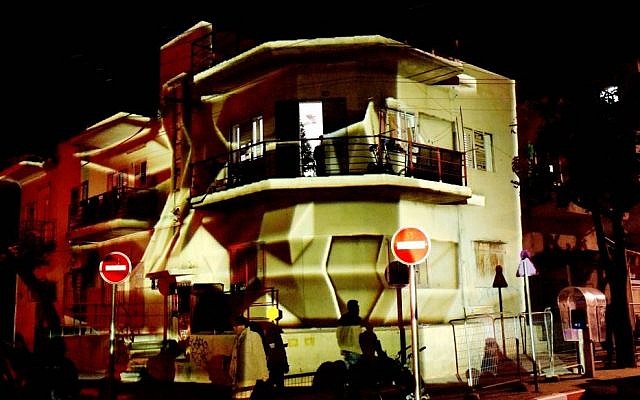Light installations utilized the unique buildings of South Tel Aviv, both run-down apartment buildings and abandoned lots. (courtesy Kfir Sivan/Tel Aviv Municipality)