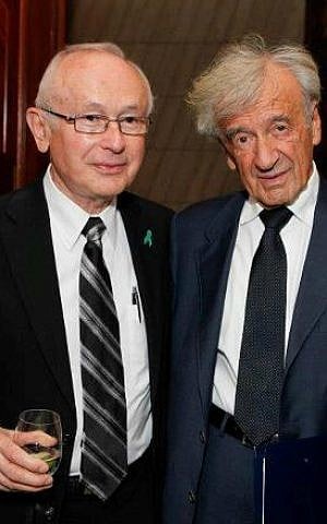 Robbie Waisman (left) with fellow Buchenwald child survivor Elie Wiesel. (Courtesy)