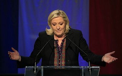 Far Right National Front party leader Marine Le Pen delivers her speech after the results of the second round of the regional elections in Henin-Beaumont, northern France, Sunday Dec.13, 2015. (AP Photo/Thibault Camus)