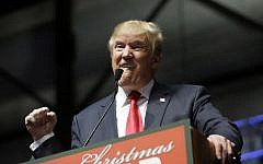 Republican presidential candidate, businessman Donald Trump, addresses supporters at a campaign rally, Monday, Dec. 21, 2015, in Grand Rapids, Mich. (AP Photo/Carlos Osorio)