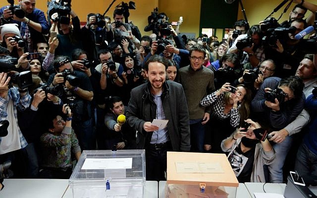 Pablo Iglesias, leader of the Podemos party, casts his vote in Spain's general elections in Madrid, Sunday, Dec. 20, 2015. (AP Photo/Emilio Morenatti) Pablo Iglesias, leader of the Podemos party, casts his vote in Spain's general elections in Madrid, Sunday, Dec. 20, 2015. (AP Photo/Emilio Morenatti)