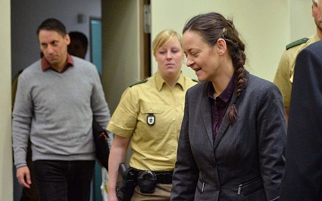 Terror suspect Beate Zschaepe, right, and Ralf Wohlleben , left, enter the court room in Munich, southern Germany, Tuesday, Dec. 8, 2015. (AP Photo/Kerstin Joensson) Terror suspect Beate Zschaepe, right, and Ralf Wohlleben , left, enter the court room in Munich, southern Germany, Tuesday, Dec. 8, 2015. (AP Photo/Kerstin Joensson)