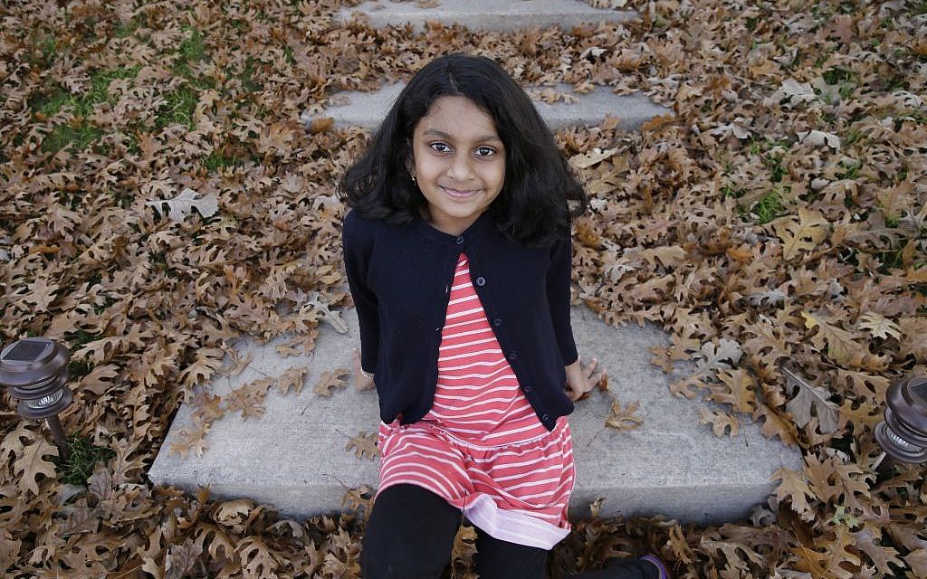 Noreen Shakil, 9, smiles for a photo on the steps outside her home in McKinney, Texas, on December 11, 2015. Donald Trump's remarks in the wake of the December 2 shooting attack in San Bernardino, California, have stoked fears in Muslim children across the US. (AP/LM Otero) Noreen Shakil, 9, smiles for a photo on the steps outside her home in McKinney, Texas, on December 11, 2015. Donald Trump's remarks in the wake of the December 2 shooting attack in San Bernardino, California, have stoked fears in Muslim children across the US. (AP/LM Otero)