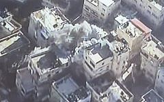 An aerial view of a house belonging to the family of a dead terrorist being demolished in Jerusalem's Shuafat refugee camp on Wednesday, December 2, 2015 (Israel Police)