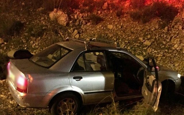 A crashed car on the side of the road after being shot at near the West Bank settlement of Avnei Hefetz on December 9, 2015. (Photo by Magen David Adom) A crashed car on the side of the road after being shot at near the West Bank settlement of Avnei Hefetz on December 9, 2015. (Photo by Magen David Adom)