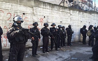 Israeli police at the scene of a home demolition in East Jerusalem's Shuafat refugee camp on Wednesday, December 2, 2015 (Israel Police)