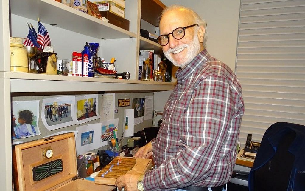 File: Alan Gross displaying his Cuban cigars at his apartment in Washington, DC, Dec. 23, 2015. (Suzanne Pollak/Washington Jewish Week)