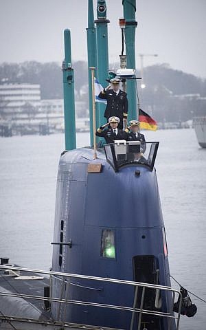 AvI-FsAg_SQxrEluwqJrDzgoORRb3DUcyVWfwhRCL_38 Israel Navy commander Ram Rothberg salutes as the INS Rahav, Israel's newest submarine, sets off from the German port of Kiel towards Haifa, where it is set to arrive next month, on December 17, 2015. (IDF Spokesperson's Unit)