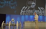 Intel CEO Brian Krzanich controlling a hoard of spider bots with a wave of his hand, via Intel RealSense at the Intel Developer Forum, August 18, 2015 (Intel)