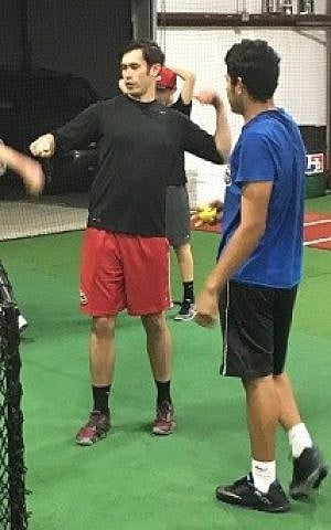 In Israel, ex-minor leaguer Brent Powers will convey his pitching knowledge to aspiring players, as he does here at a Houston academy. (Courtesy of Brent Powers)