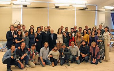 Lyricist Sheldon Harnick, standing center, and the cast of “Fiddler on the Roof” at New West 42nd Street Studios. (Lindsay Hoffman/Jeffrey Richards Associates)