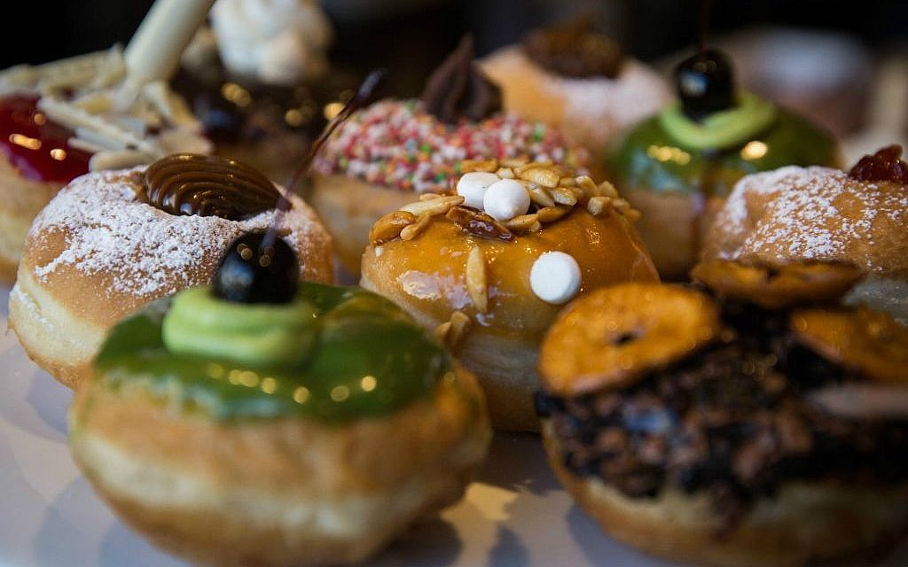 Just some of the delectable options at Roladin, which offers donut-making workshops at its Kadima visitor's center over Hanukkah, 2015 (Hadas Parush/Flash 90) Just some of the delectable options at Roladin, which offers donut-making workshops at its Kadima visitor's center over Hanukkah, 2015 (Hadas Parush/Flash 90)